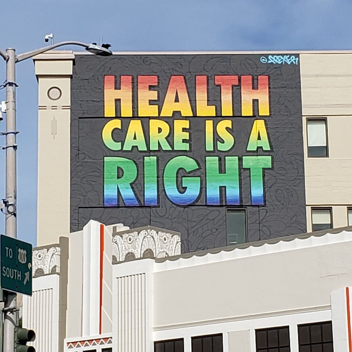 An enormous wall mural stating that Health Care is a Right.
