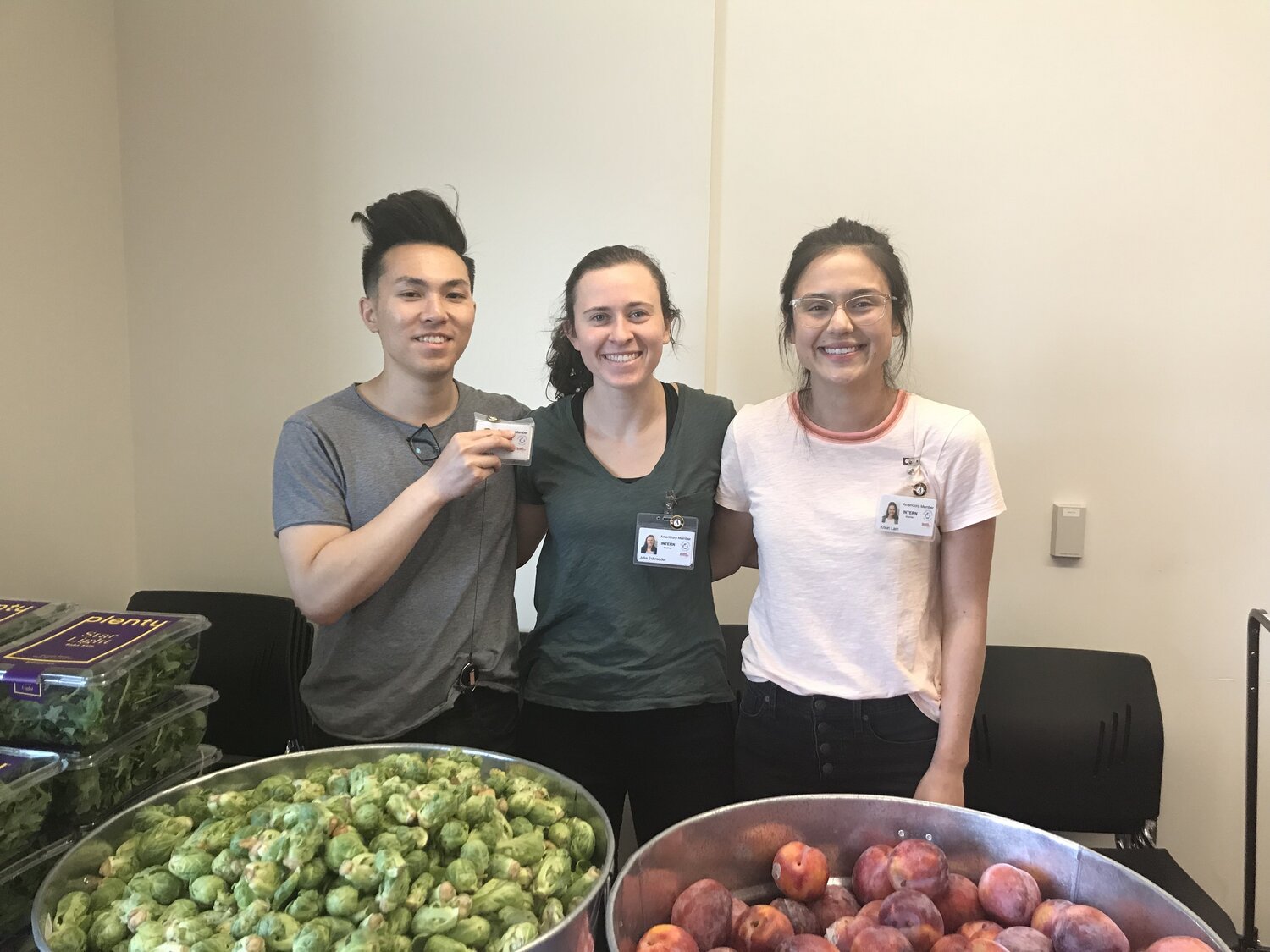 Wesley Ho, Julia Schroeder, and Kristin Lam serving at the HealthRight 360 Food Pharmacy.