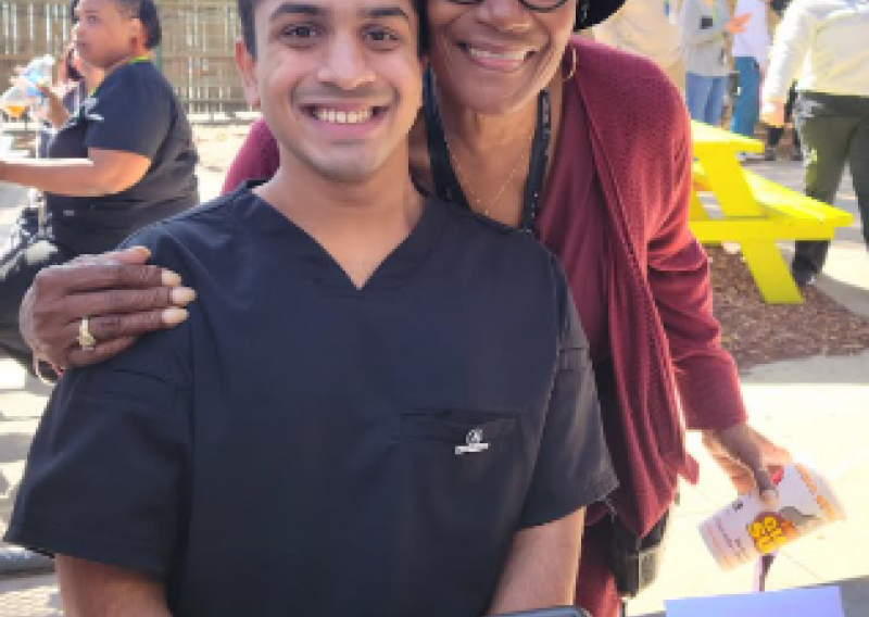 Rehan is pictured with a member of the Sulzbacher Community.