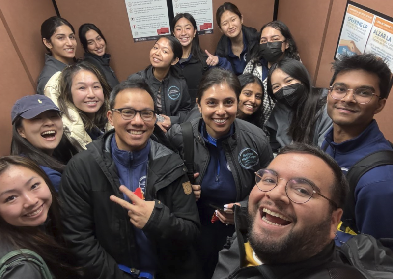 The 2024-2025 NHC SF Cohort squeezes into an elevator on their Annual Member Retreat. 