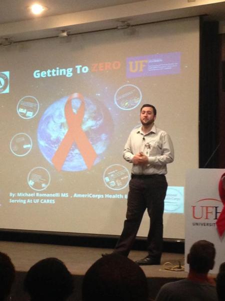 Michael Romanelli presenting at World AIDS Day education event.
