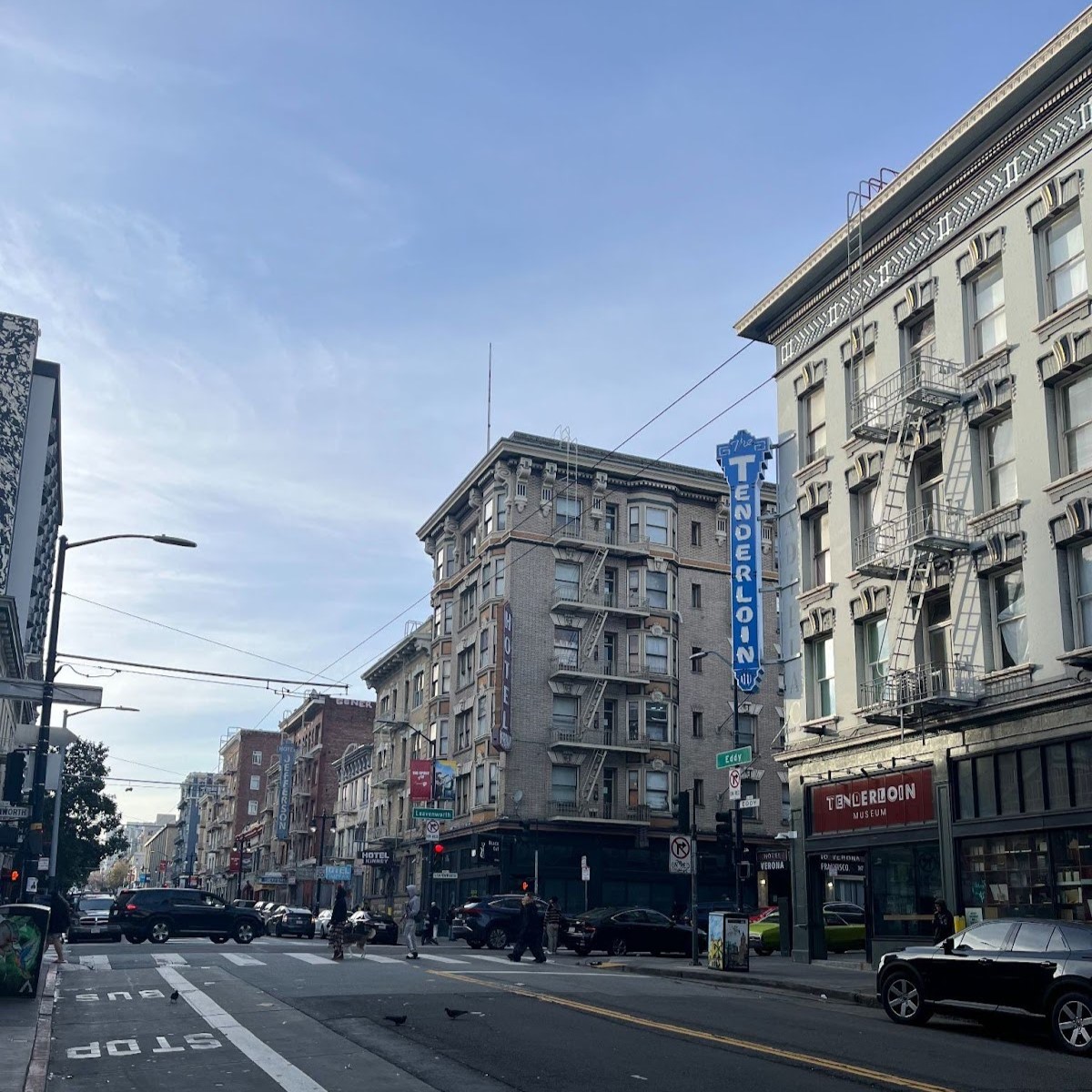 A photo of the Tenderloin neighborhood, with one of the PSH units in the frame. 